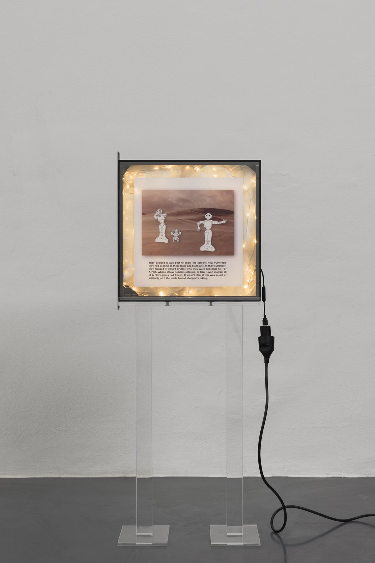 Cécile B. EvansTest card III, 2016Custom acrylic stands, anodized server case, UV media print on acrylic, foam gauze, LED light wire, cables118.5 x 44 x 20 cm
