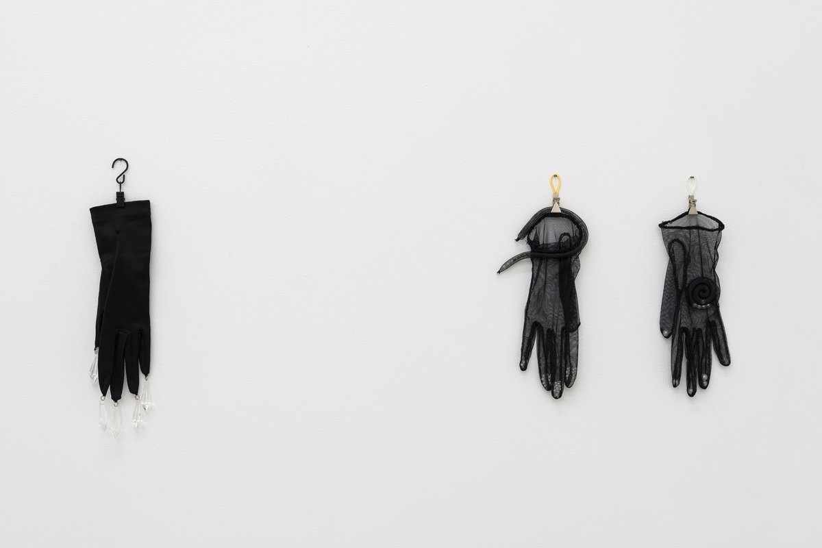 (left)Cinzia RuggeriGuanto con cristalli (Glove with crystals), 1983Satin glove, glass pendants28 x 9 cm(right)Cinzia RuggeriGuanti con perle (Gloves with pearls), n.d.Net gloves, synthetic pearls26 x 7 cm