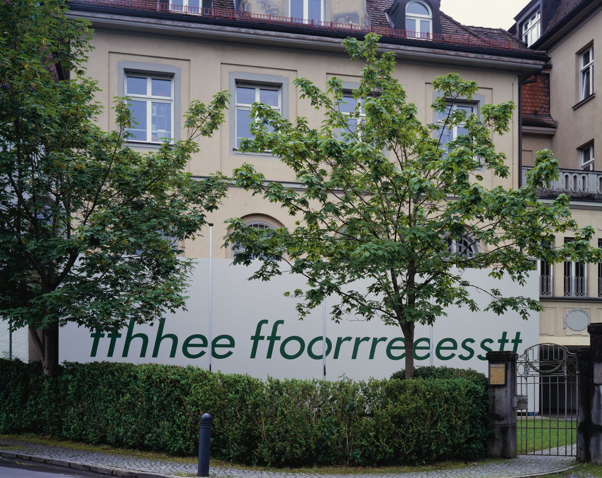Kunst in der Stadt III, 1999Installation view: Gaylen Gerber with Kay Rosen, Backdrop/The Forest for the Trees, acrylic paint and enamel sign paint on canvas, n.d., 1999, 4.23 × 13.4 m (166 × 488 in.)Kunsthaus Bregenz, Bregenz