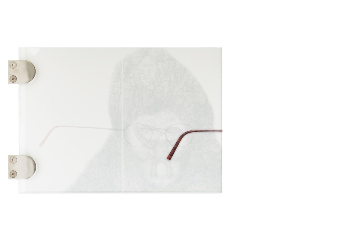 Niklas LichtiDer Spinnenkuss, 2015Inkjet print on backlit film, reading glasses, sandblasted glass, steel, verso35 x 25 cm